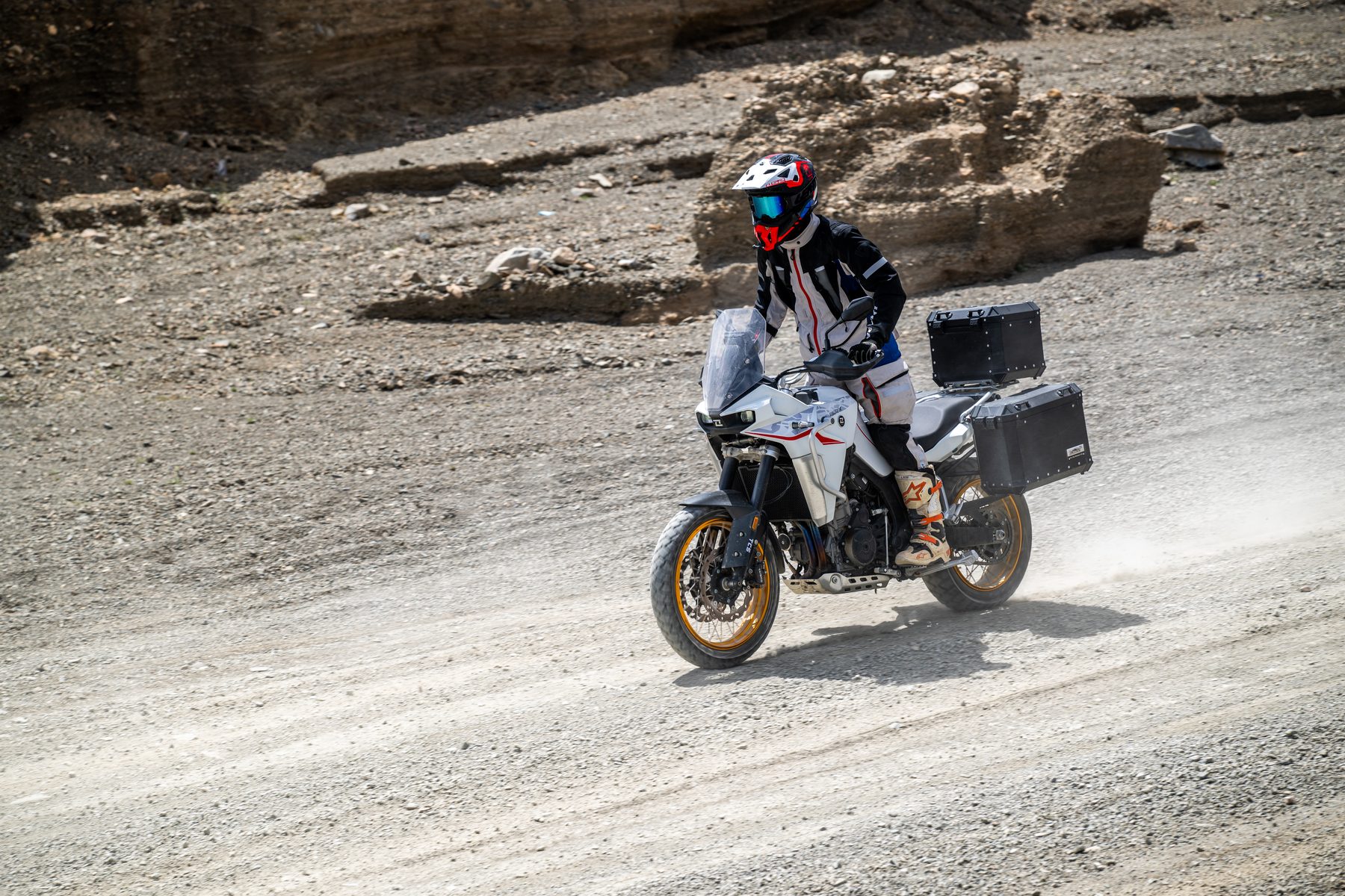A KOVE 800X on a gravel mountain road